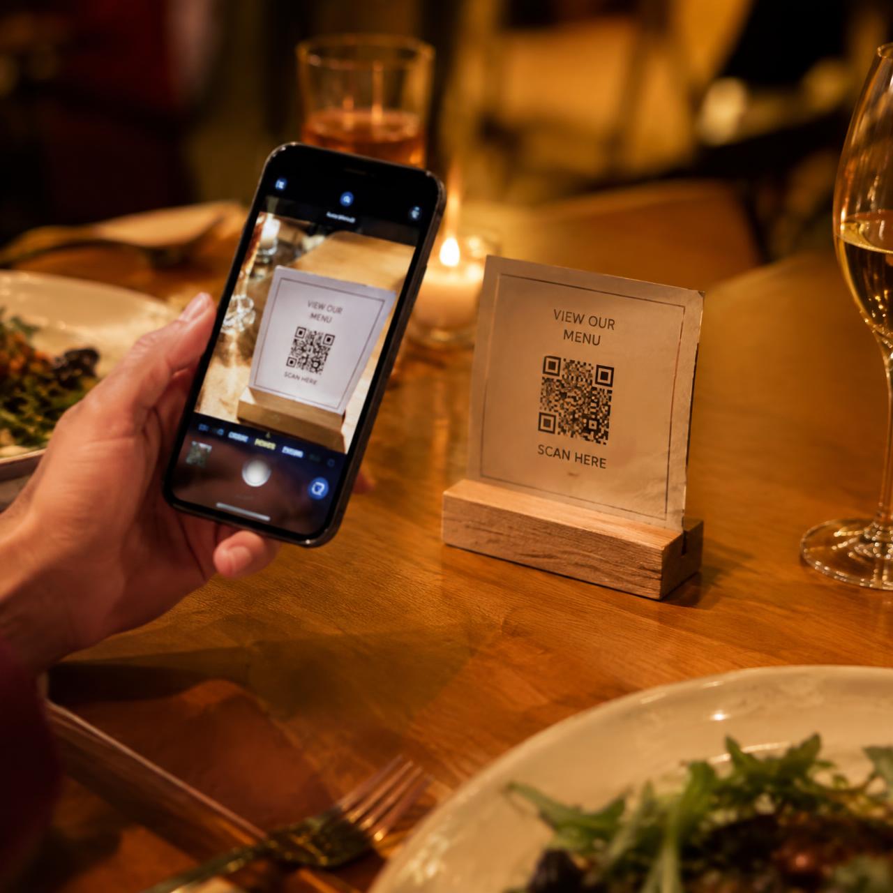 Diner scanning a table QR code